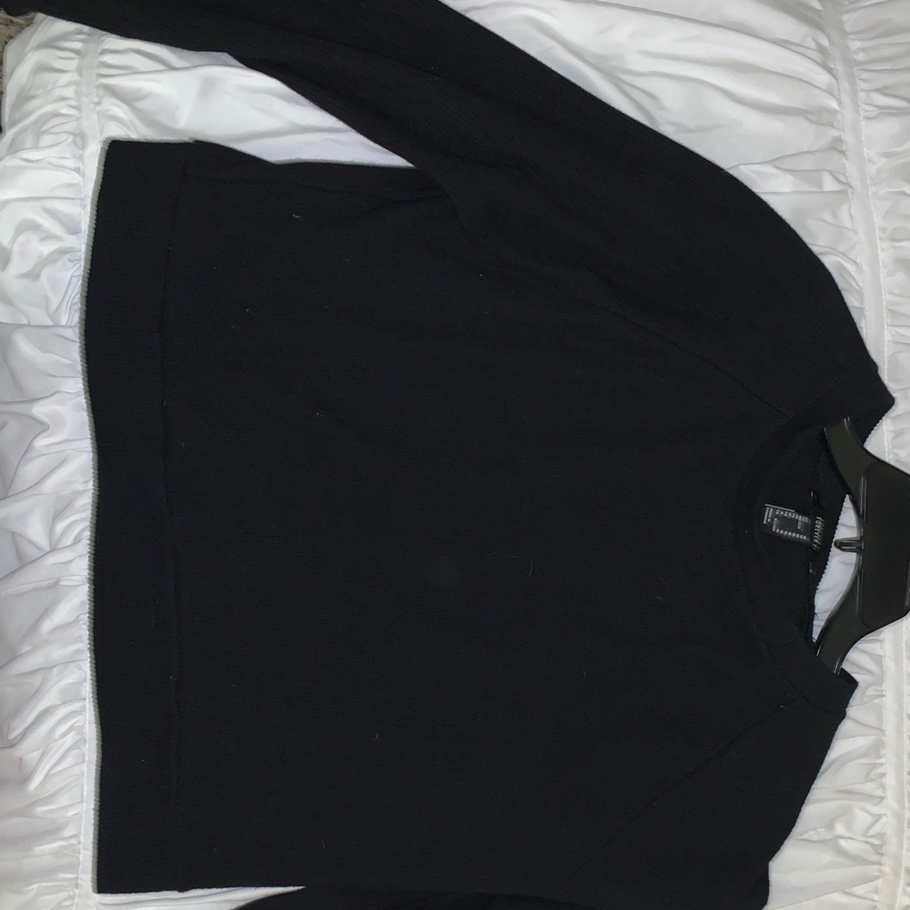 bundle of seven sweaters